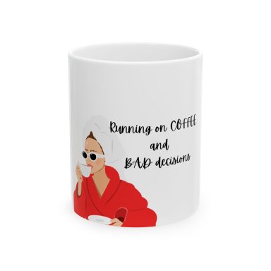 ⁠White ceramic mug with graphic of a woman in a white hair towel, white sunglasses, and a red robe sipping coffee. Coffee and bad decisions